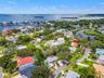Sweeping aerial view of Ozona and St. Joseph Sound—an incredible location for enjoying the boating, biking, dining, and laid-back coastal lifestyle.
