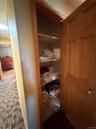 Upstairs hall closet, linens, toiletries, and storage