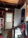 doors from the 1 car garage, into the home, and to the backyard