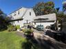 wonderful patio, with entry to kitchen and garage, full gates to driveway