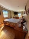 generous primary, with wall of closets