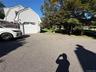 garage and front yard, quite private from the road