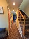 stairway and hallway from the front door, to the den? Dining room? Office?