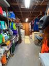 Washer/Dryer, chest freezer, and more in this storage area in the basement