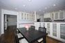 Dining area featuring dark wood-type flooring, recessed lighting, and radiator