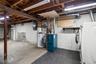 This area also houses the Burnham gas boiler & a Buderus 30 gallon hot water tank.