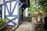 Entrance to property featuring stucco siding