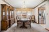 The formal dining room is spacious enough for a large dining table.
