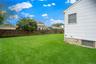 This is the view from the left side of the home, looking towards the back yard.