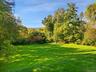 Spectacular west-facing views of the property from the living room & deck.