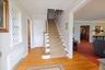 Enter Into This Large Foyer With a Beautiful Leaded Glass Window and Hardwood Floors Throughout