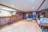 Large 850 sq ft Recreation space in basement (recessed  lighting, high ceilings, and original Pecky Cypress wood walls).