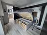 RV: Master bedroom suite. King bed lifts for additional storage