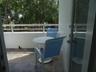 Queens Suite East balcony with dining