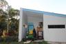Carport with Johne Deere mower, (Included). Plus fully equipped lockable workshop