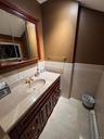 Half bath, upstairs hallway, toilet and sink, can be made to be a full bath