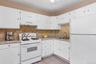 2nd floor kitchen, large enough for a table.