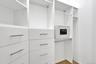 Primary Bedroom Closet with Closet Organizers