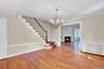 Non Staged Dining room looking a stairs to 2nd floor