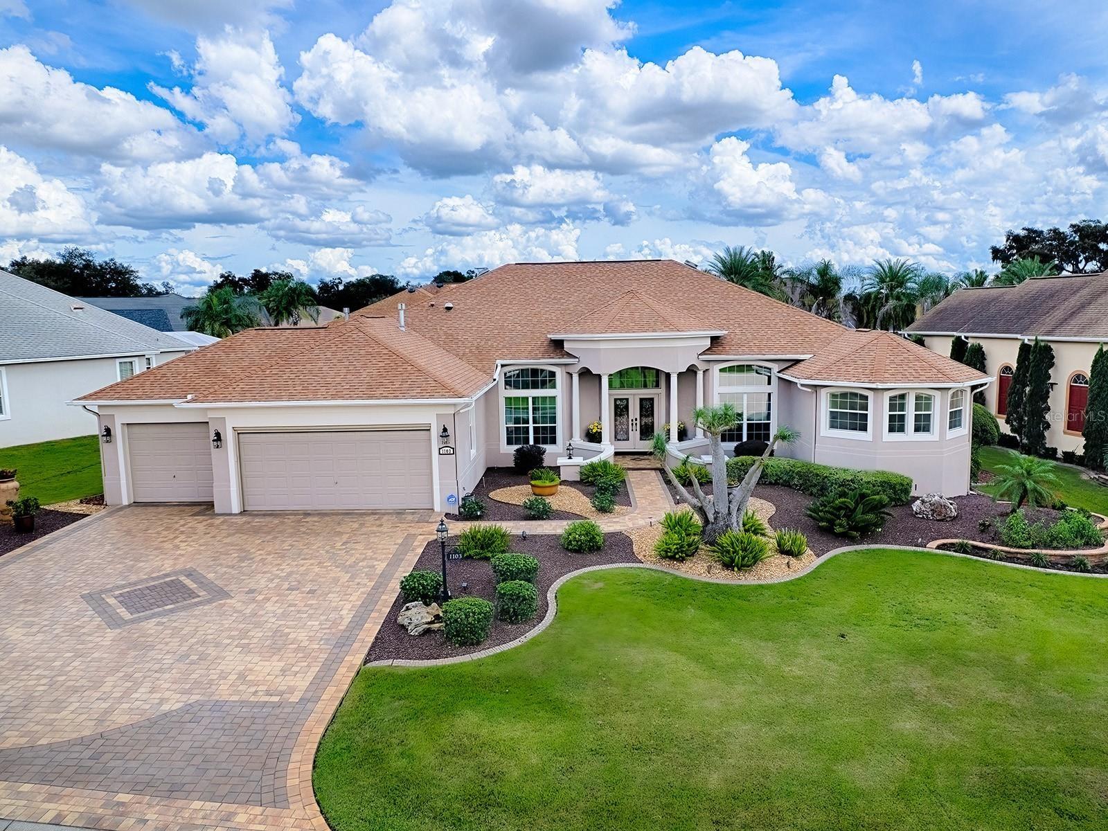BOND PAID ON THIS SPECTACULAR CUSTOM 4700+ SF 4 BEDROOM, 3 BATH, AND 3 GAR GARAGE WITH AN AMAZING POOL AND SPA, OUTDOOR KITCHEN AND LOVELY TROPICAL SU