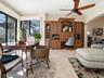 THE FAMILY ROOM FLOWS INTO THE BONUS ROOM WITH MORE SEATING FOR DINING AND/OR CARDS ANYONE? LOVELY BUILT-INS TOO!