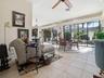 THE FAMILY ROOM AND THE BONUS AREA HAS A GREAT VIEW OF THE POOL AND LANDCAPING.