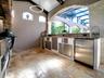 LOTS OF STORAGE AND COUNTER SPACE.