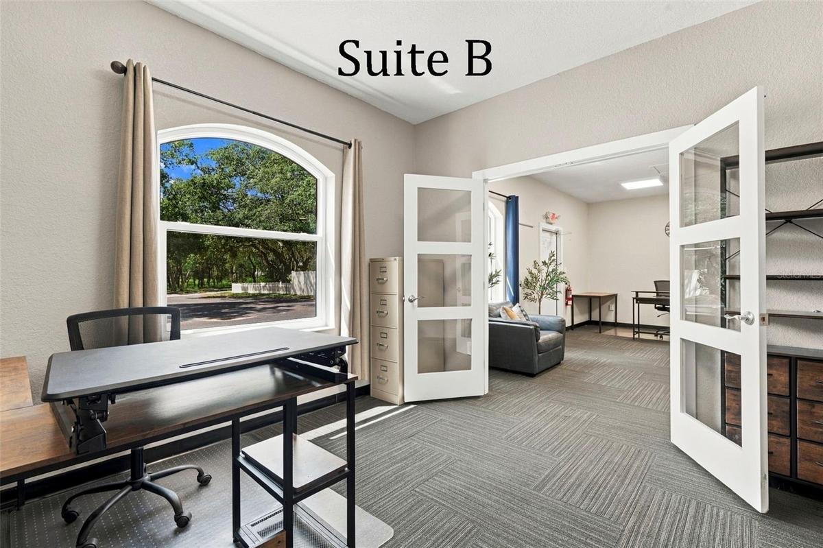 Double Glass Doors into Suite B, with Private Full Bathroom, Window to the Front of the Office, located by the Lobby