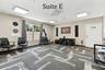 Suite E has a private entrance, large window overlooking the landscaping, a private restroom and has access to the Covered Patio Break Area