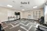 Suite E has a private entrance, large window overlooking the landscaping, a private restroom and has access to the Covered Patio Break Area