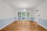 With french doors to screened in porch.