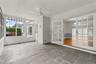 French doors opening to screened terrace