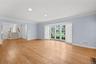LIving room with entry hall.