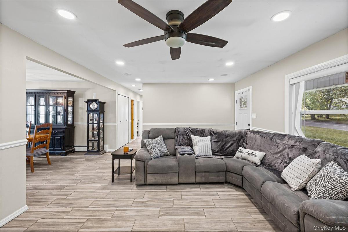 Open floor plan flowing into dining room