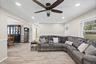 Open floor plan flowing into dining room