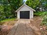 Garage door added by AI but is being replaced by seller.