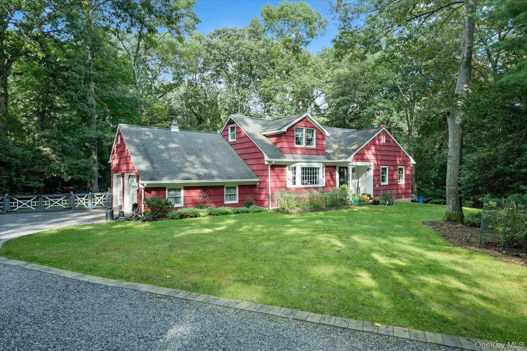 Expanded Cape set on .77 acre