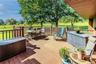 Expansive outdoor deck with wood-finish decking and perimeter railing