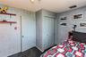 Recessed lighting, light-colored ceiling, textured wall finish, paneled interior door, and bi-fold closet doors