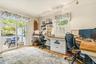 office/Possible 5th bedroom, sliding glass door to deck, hardwood flooring