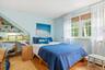 Bedroom with hardwood flooring