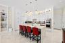 1 Palm Ter Kitchen with waterfall granite island