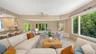 A spacious family room provides an inviting setting for everyday living while maintaining the home's sophisticated character.