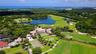 Beautifully maintained fairways and lakes showcase the exceptional golf lifestyle offered at The Oaks.