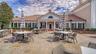 Enjoy the Florida lifestyle with inviting alfresco dining and gathering spaces within The Oaks.