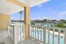 NOTE the circular staircases that runs from the unit balcony down to the pool area and private lounge area.