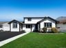 White stucco exterior with contrasting black trim