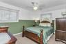 2nd Bedroom With Hard Wood Floors Under Carpet