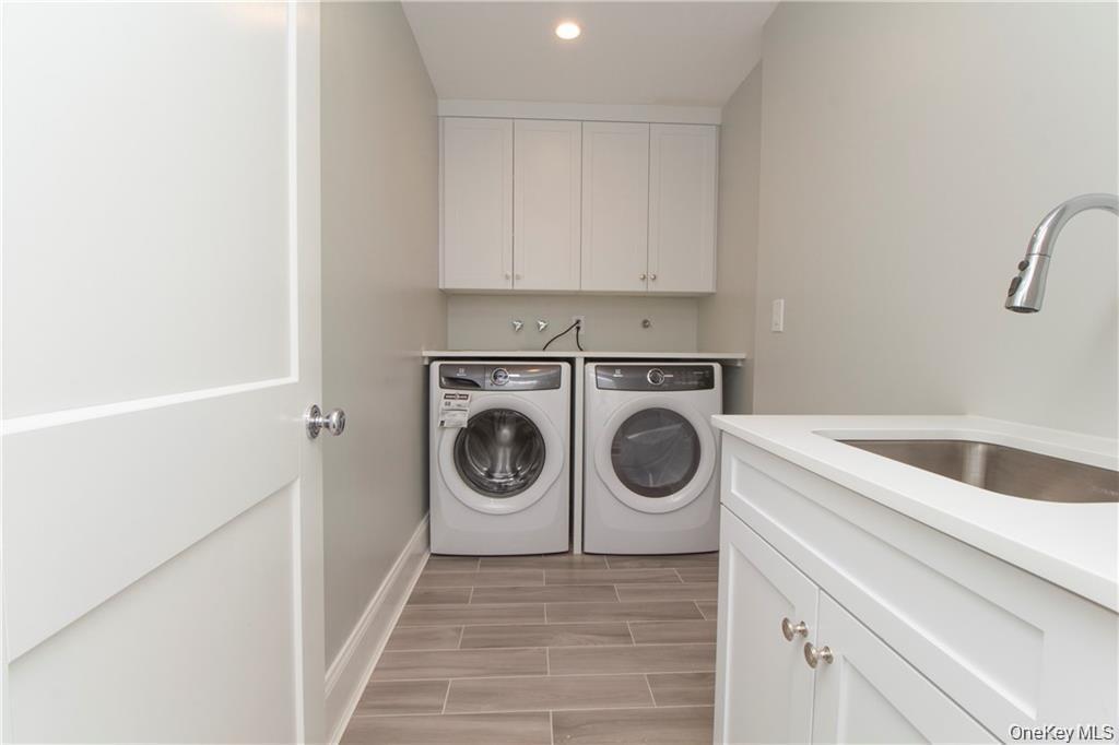 Convenient second floor laundry in another home by this builder