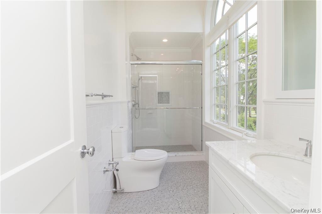 Sample of bathroom from another home by this builder